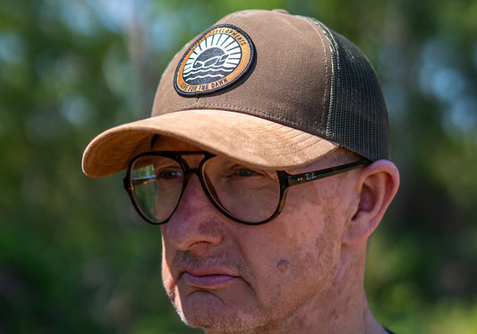 Limited edition 'Live for the Dawn' cap and tee